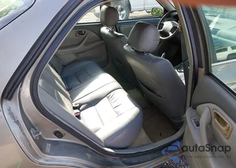 1999 Toyota Camry Le V6 from USA, damaged, VIN 4T1BF28K3XU083415